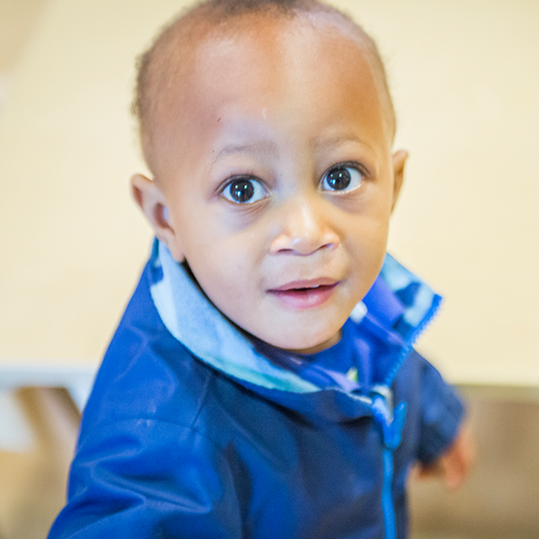 Little boy in blue jacket